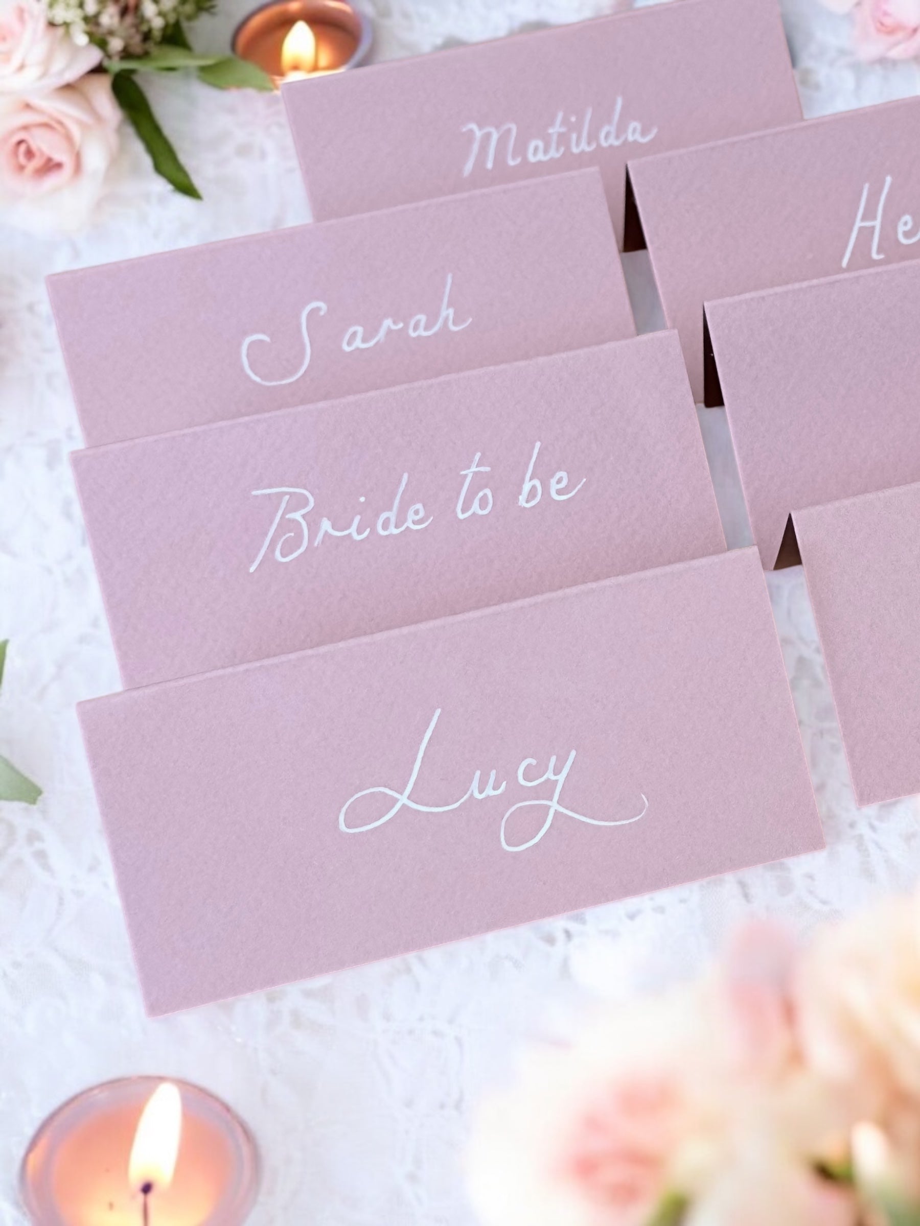 Handwritten Pastel Pink Wedding Place Cards: White Ink
