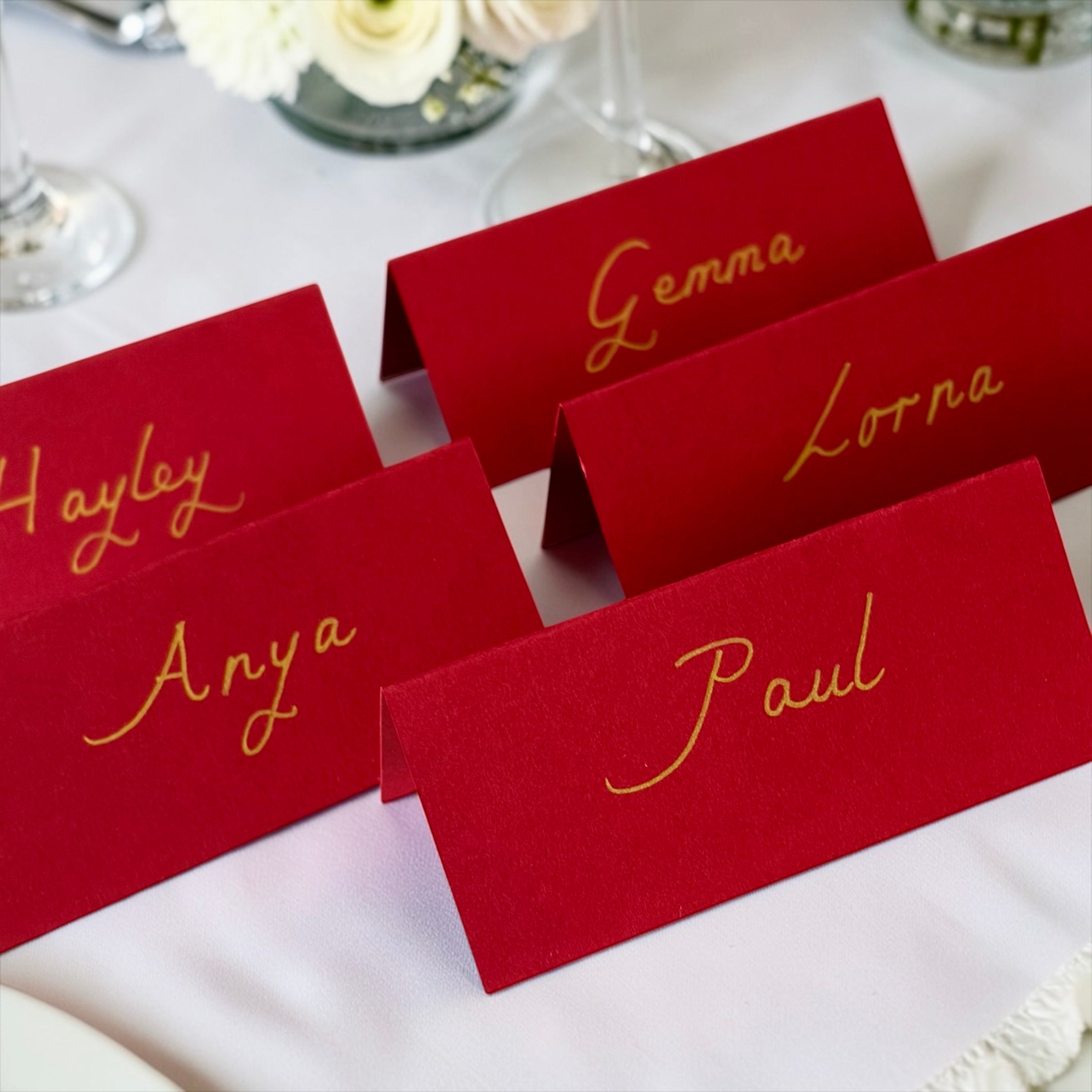 Handwritten Red Place Cards with Gold Ink