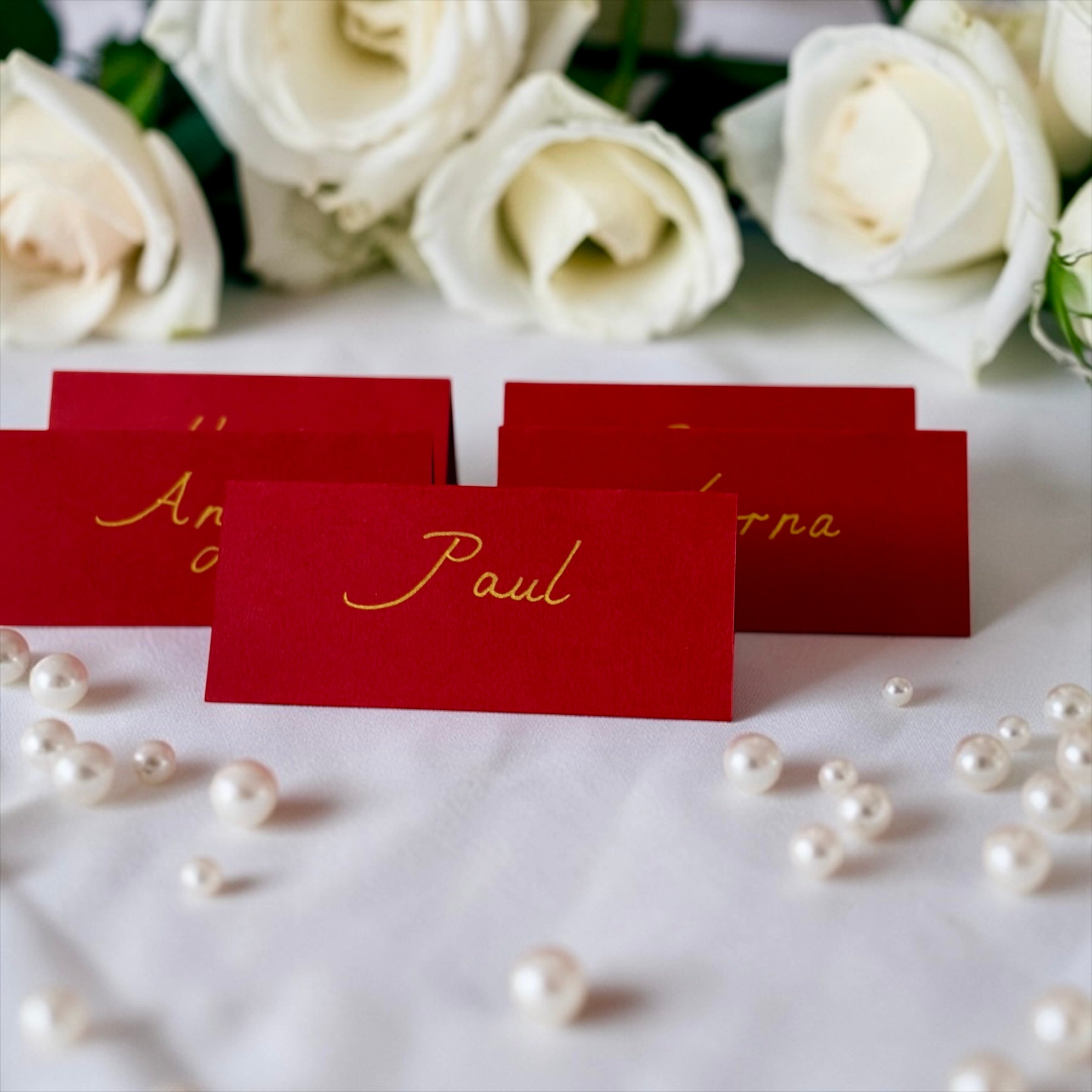 Handwritten Red Place Cards with Gold Ink