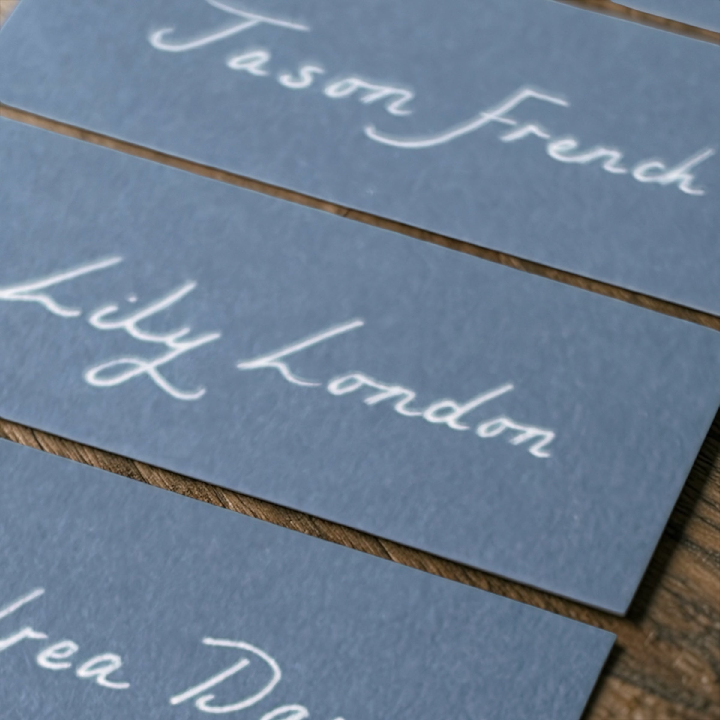 Handwritten Flat Pastel Blue Wedding Place Cards: White Ink