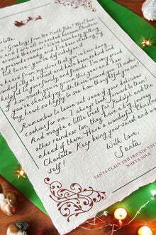 Handwritten Santa letter with festive border and Polaroid photo keepsake