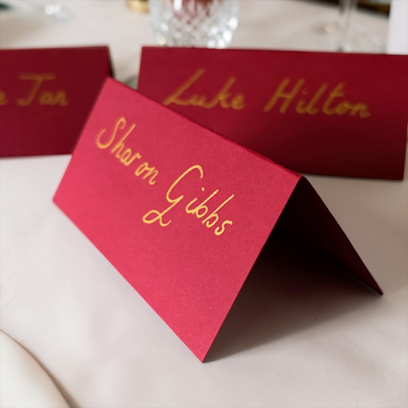 Handwritten Red Place Cards with Gold Ink