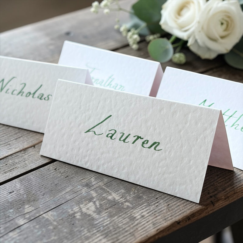 Handwritten White Wedding Place Cards: Emerald Green Ink Cursive