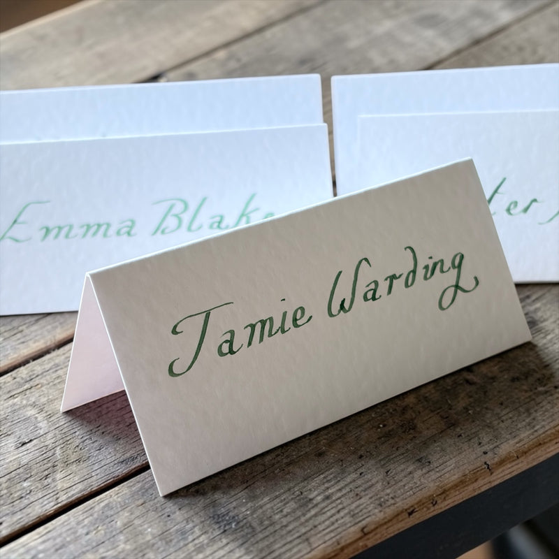 Handwritten White Wedding Place Cards: Emerald Green Ink Cursive